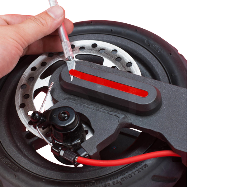 Fichier:Replace kickstand Scooters Direct Xiaomi M365 Pro Scooter Teardown rear wheel removal left reflector 28 11zon.jpg