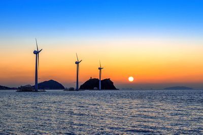 Environmental_Benefits_of_Offshore_Wind_Farms-_Powering_a_Greener_Future_wind-turbines-generating-electricity-sunset-korea_1_.jpg
